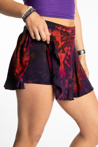 Sophie is wearing the S/M Purple Eggplant Mudmee Tie Dye Skort