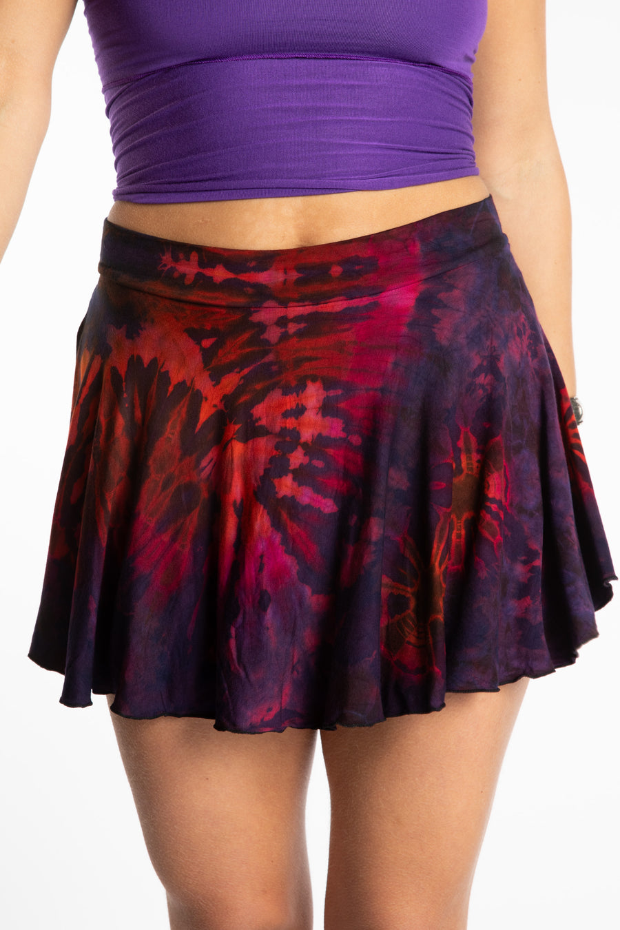 Sophie is wearing the S/M Purple Eggplant Mudmee Tie Dye Skort
