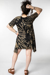 Susan is wearing a tie dye dress in black and white