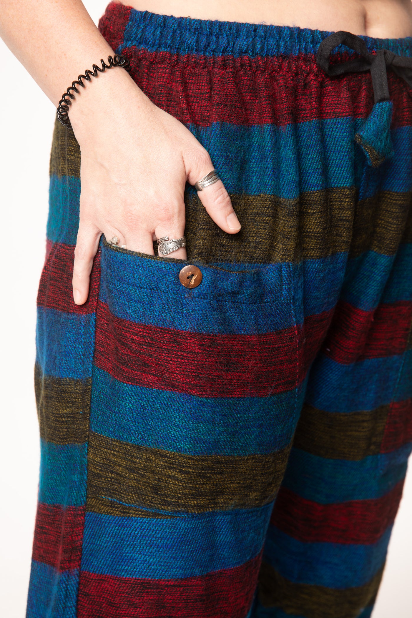 Margaret is wearing size M blanket pants in multicolor