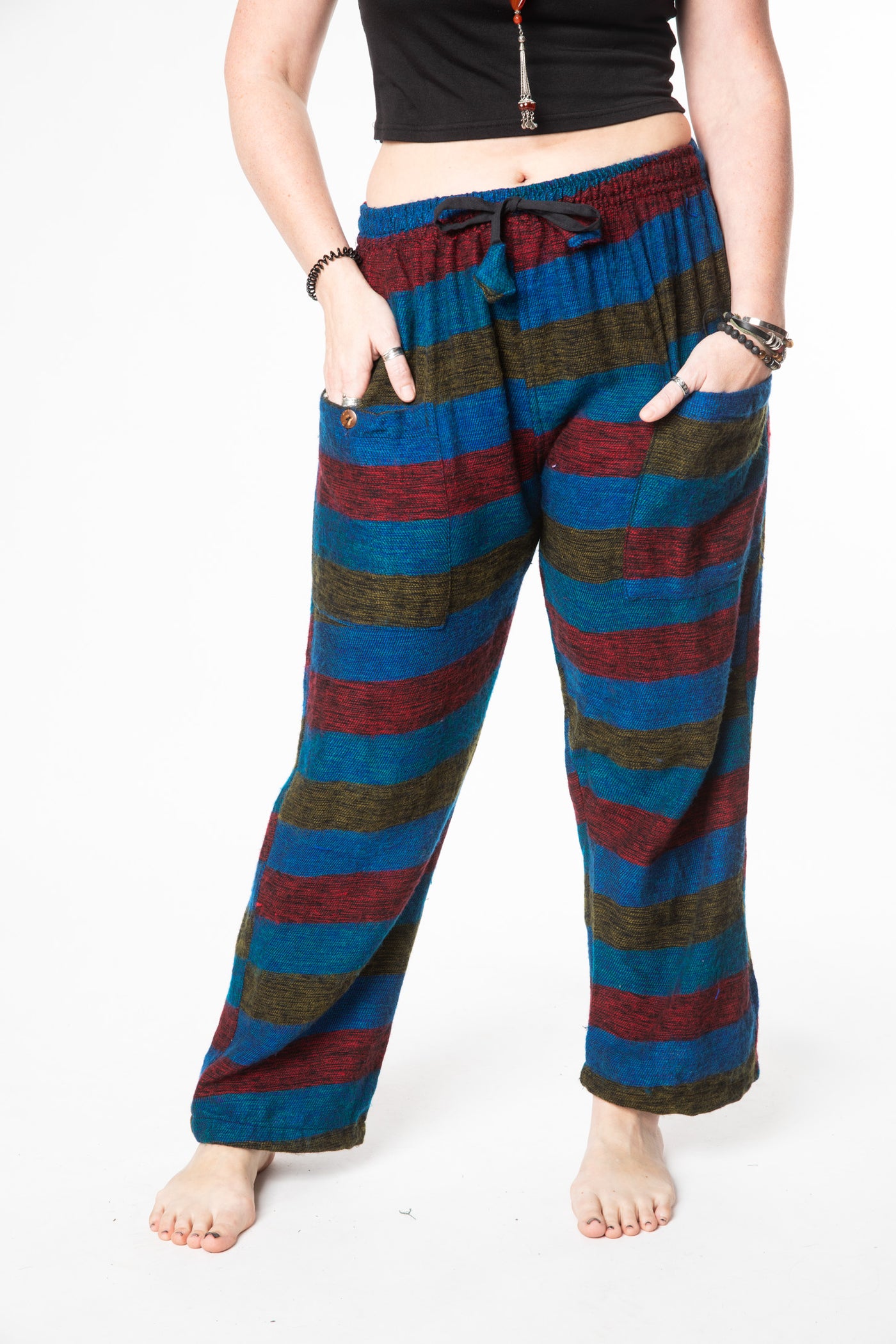 Margaret is wearing size M blanket pants in multicolor