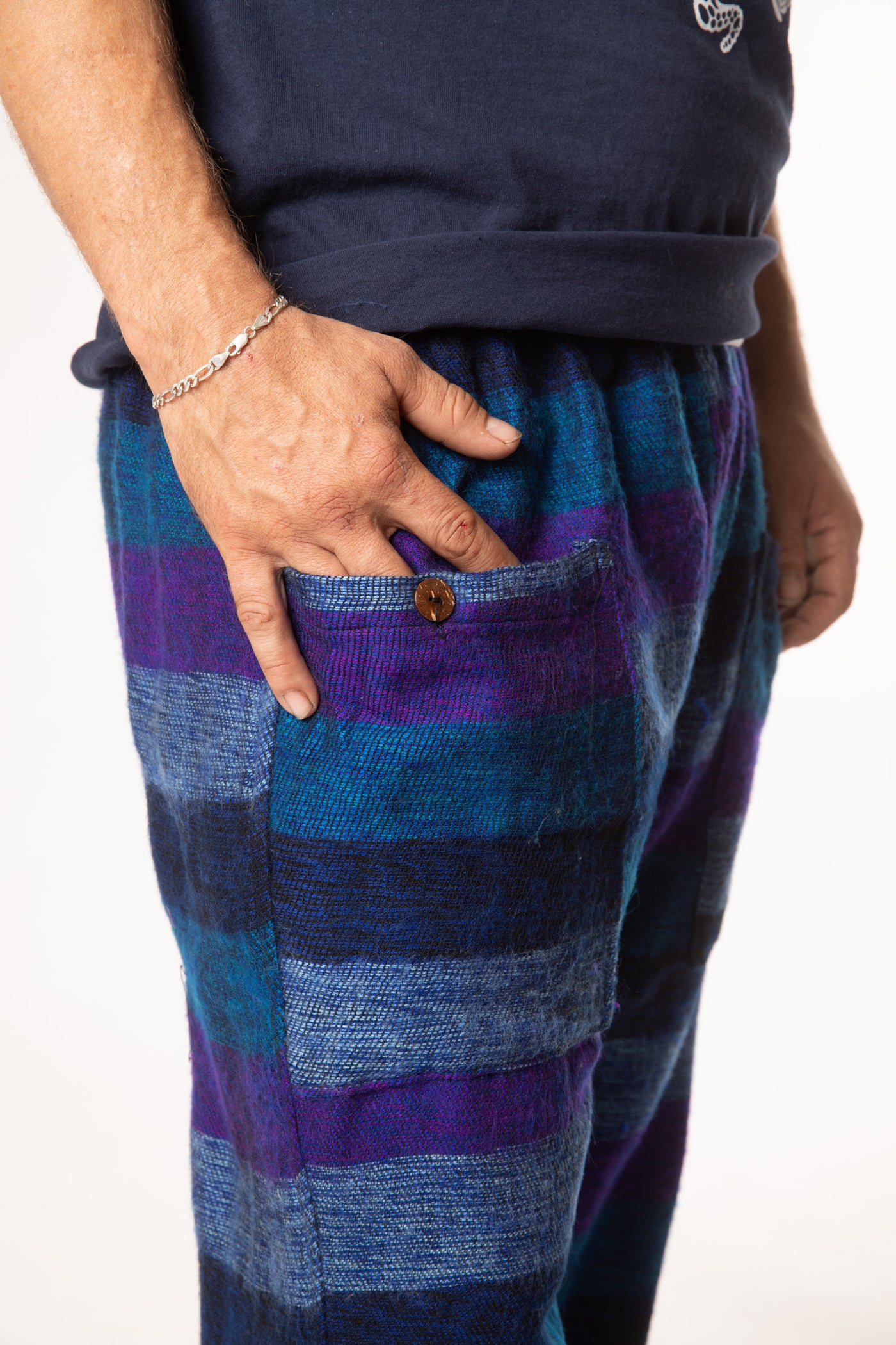 Harvey is wearing size M blanket pants in purple
