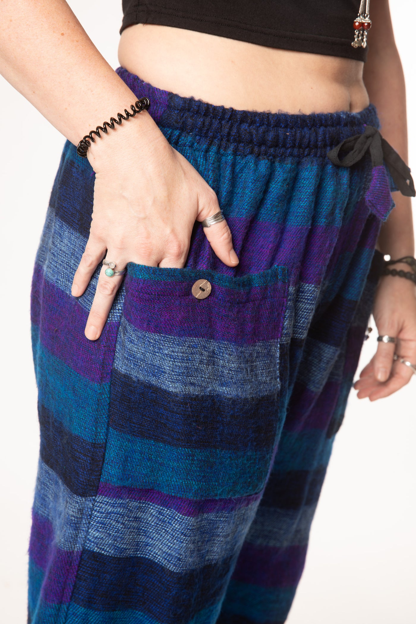 Margaret is wearing size M blanket pants in purple