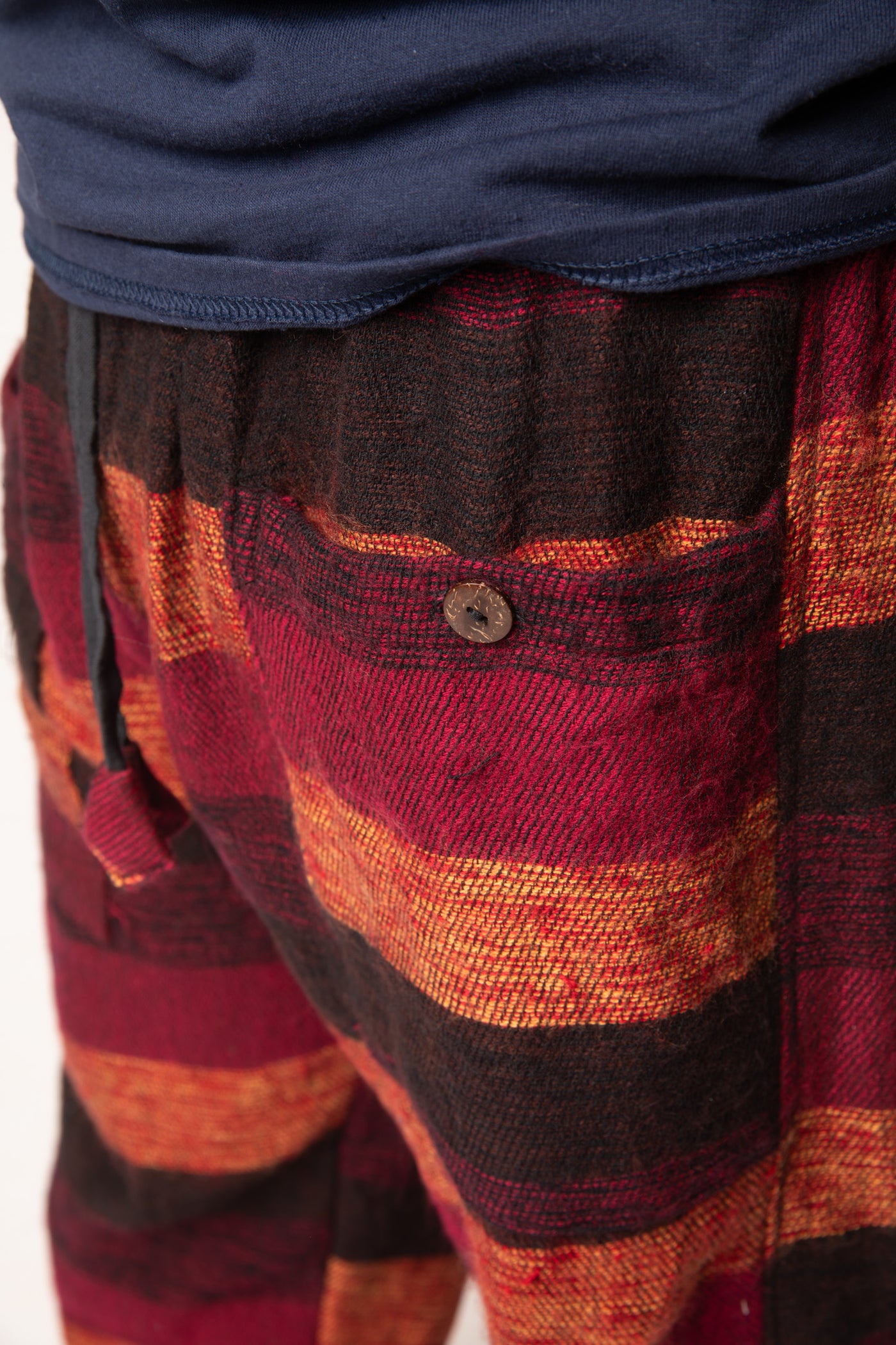 Harvey is wearing size M blanket pants in red