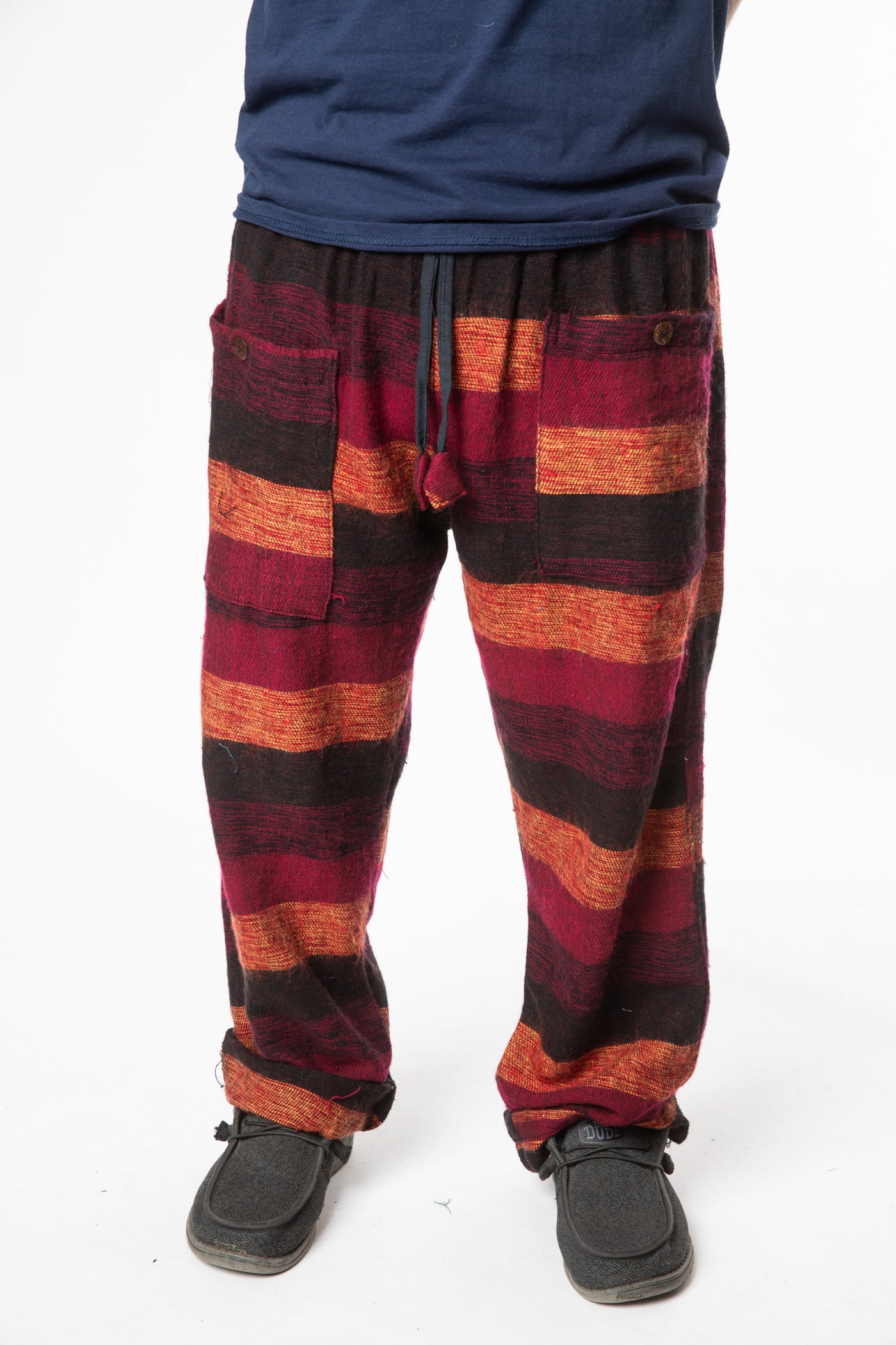 Harvey is wearing size M blanket pants in red