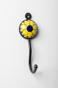 Round ceramic tile hook in sunflower