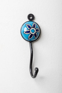 Round ceramic tile hook in turquoise floral