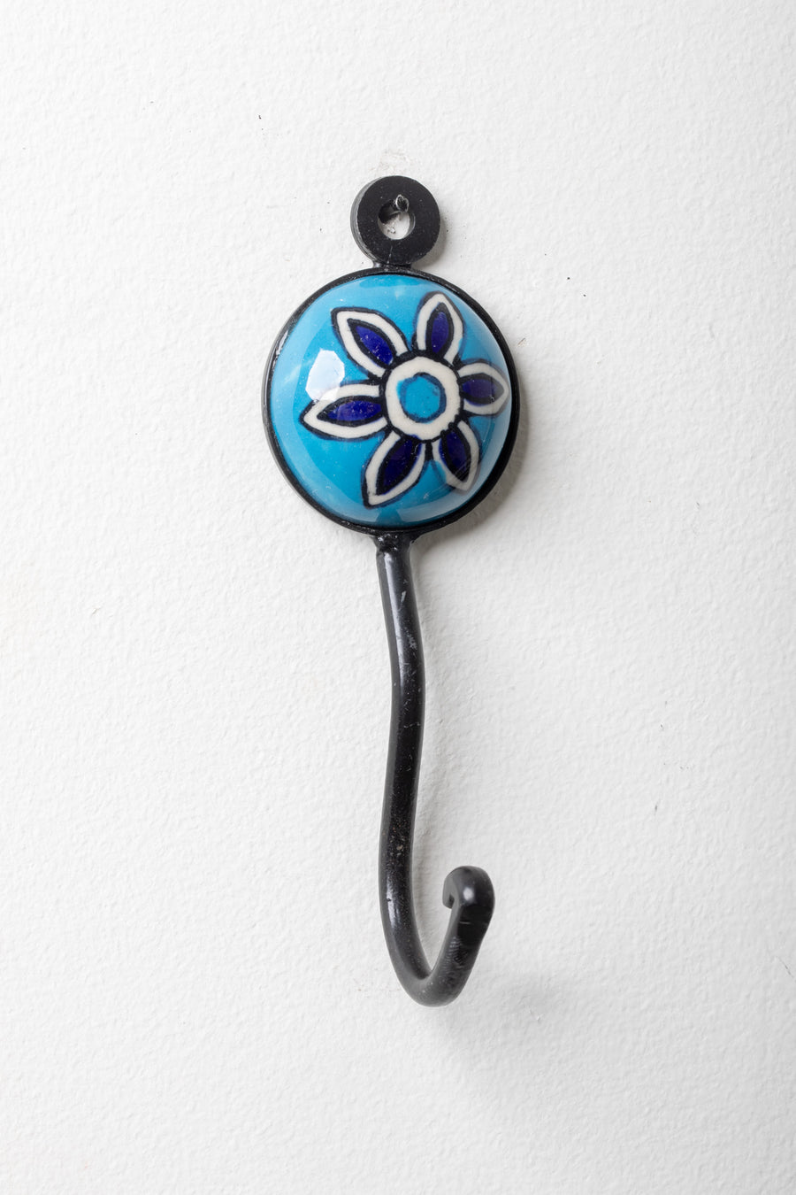 Round ceramic tile hook in turquoise floral