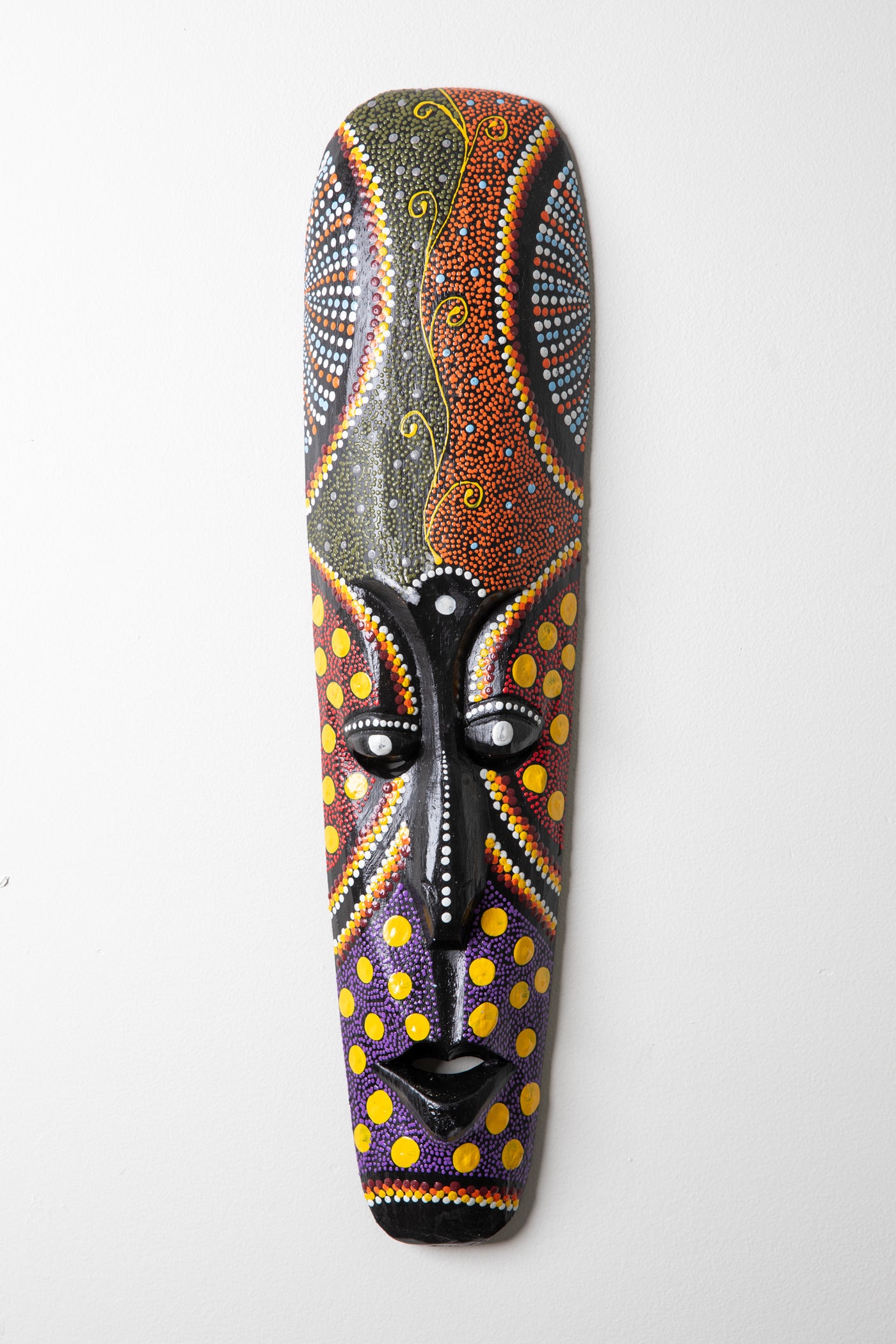 Hand painted wooden mask in green