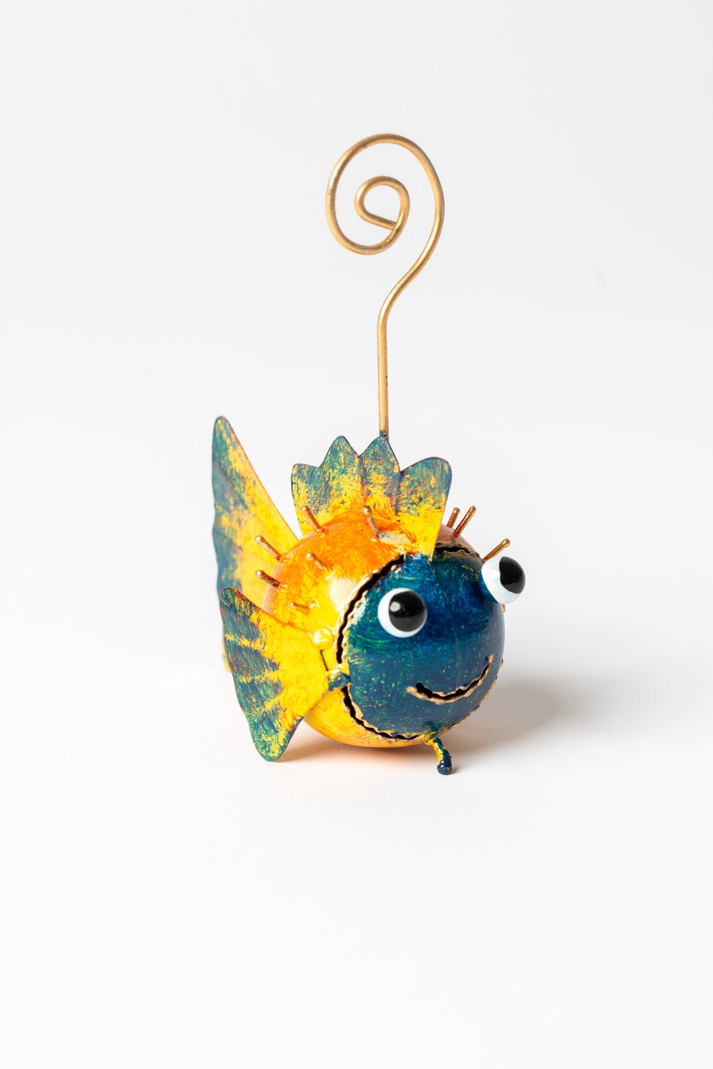 Painted tin animal card holder in fish