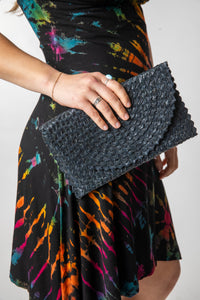 Woven clutch in black