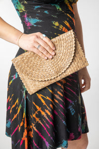 Woven clutch in sand
