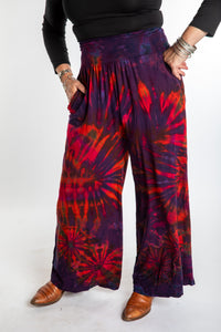 Susan wearing size S/M purple tie dye pants in eggplant
