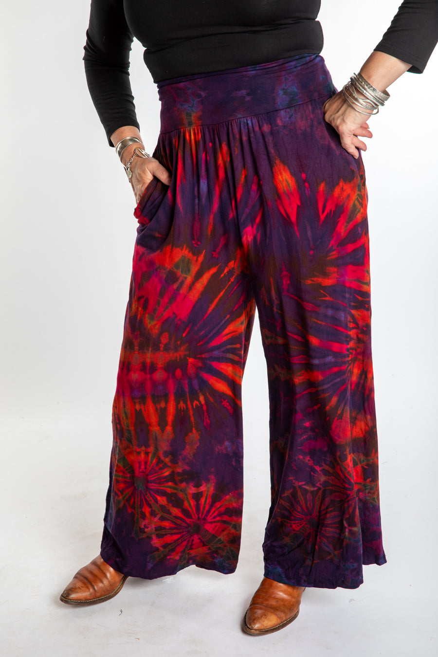 Susan wearing size S/M purple tie dye pants in eggplant