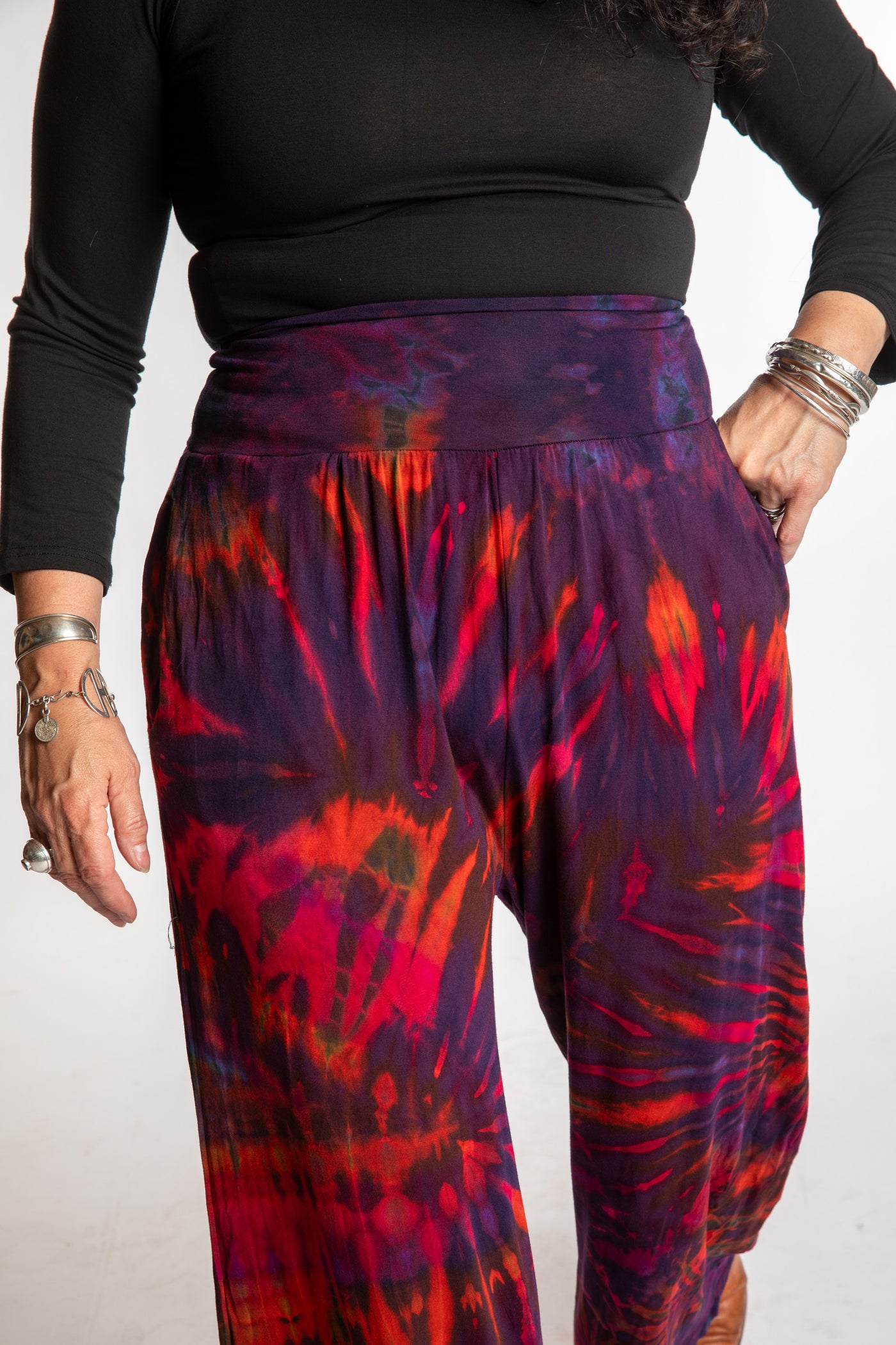 Susan wearing size S/M purple tie dye pants in eggplant