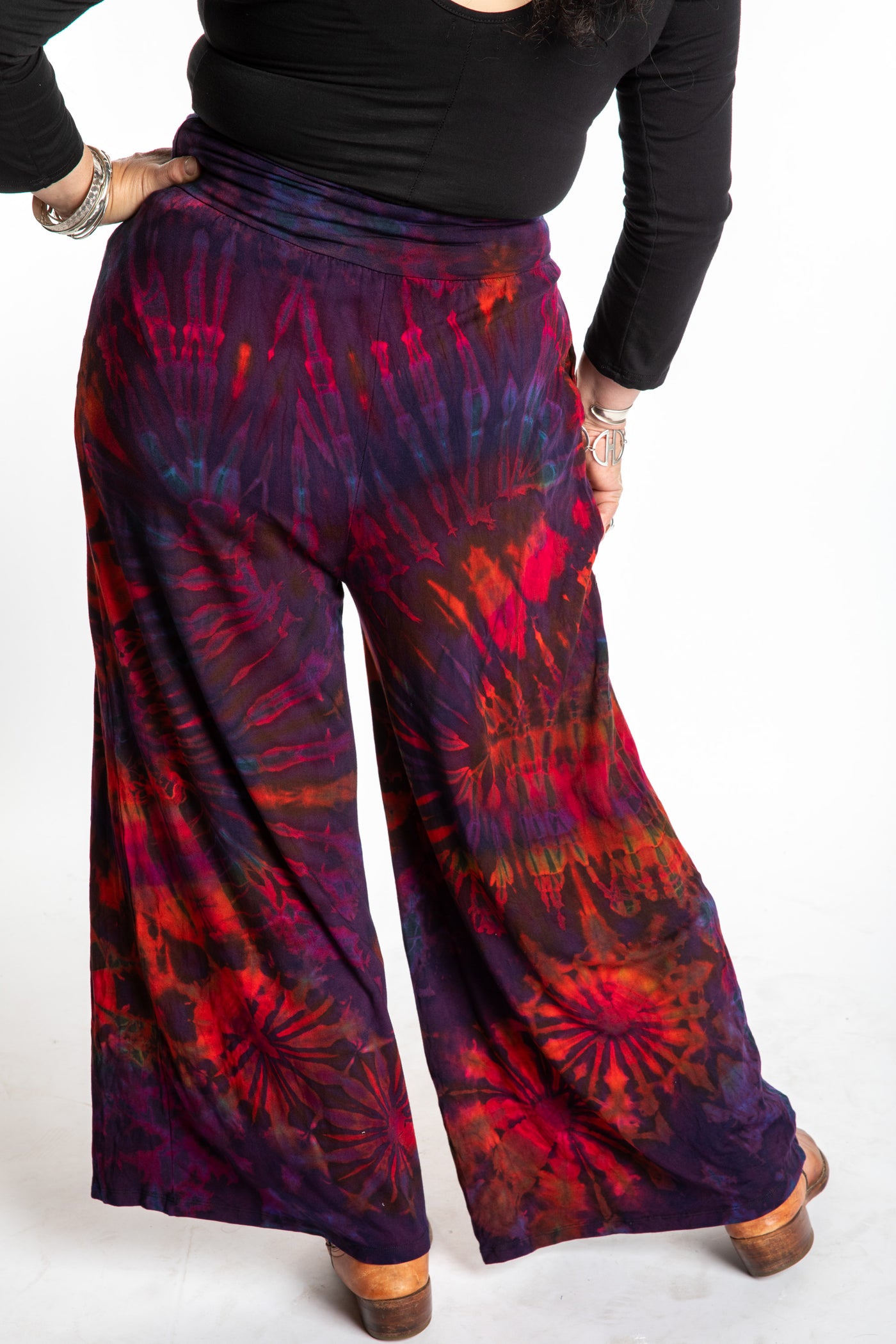 Susan wearing size S/M purple tie dye pants in eggplant