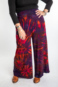Susan wearing size S/M purple tie dye pants in eggplant
