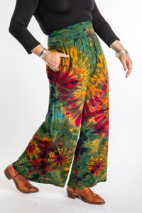 Susan wearing size S/M green tie dye pants in Green