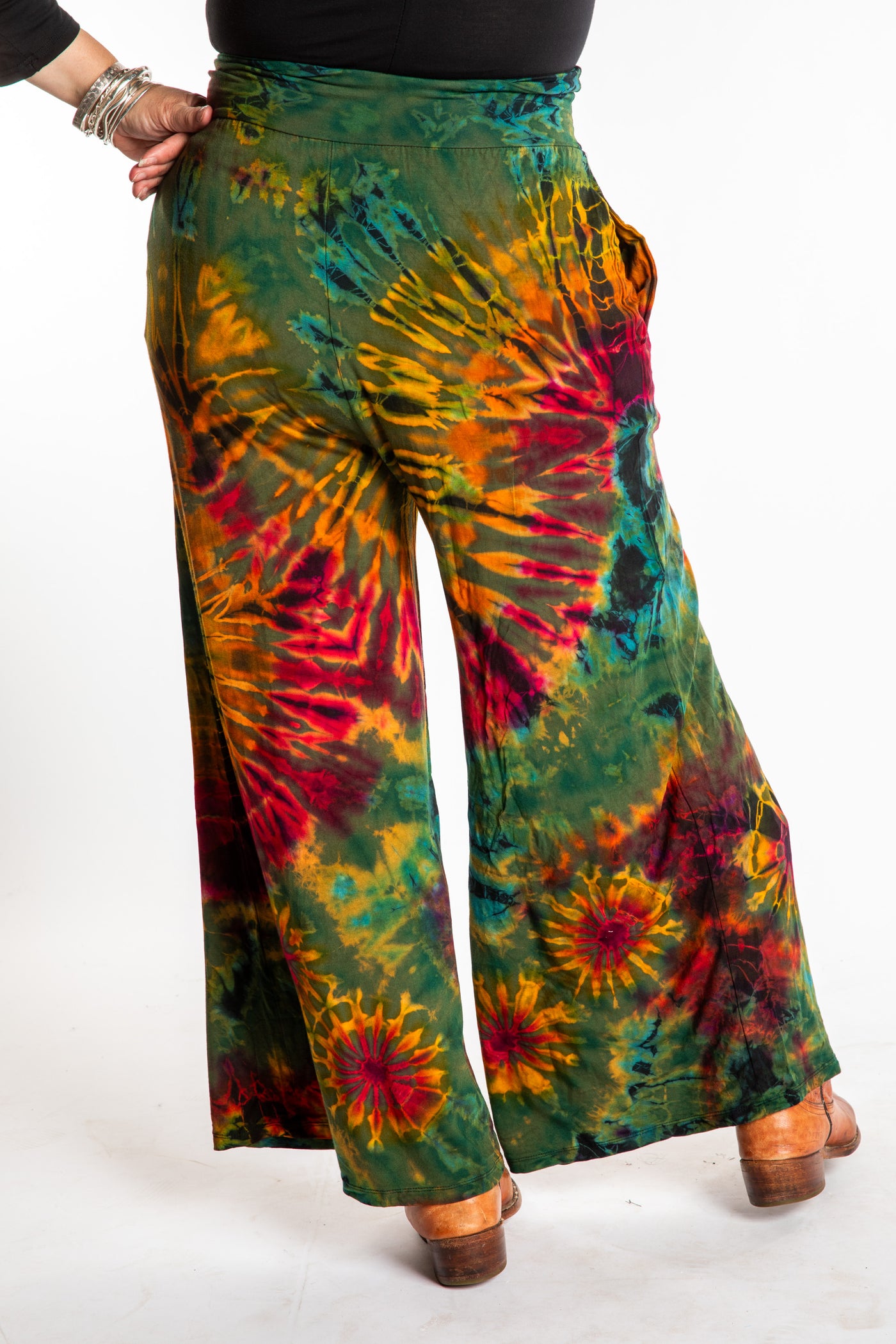 Susan wearing size S/M green tie dye pants in Green