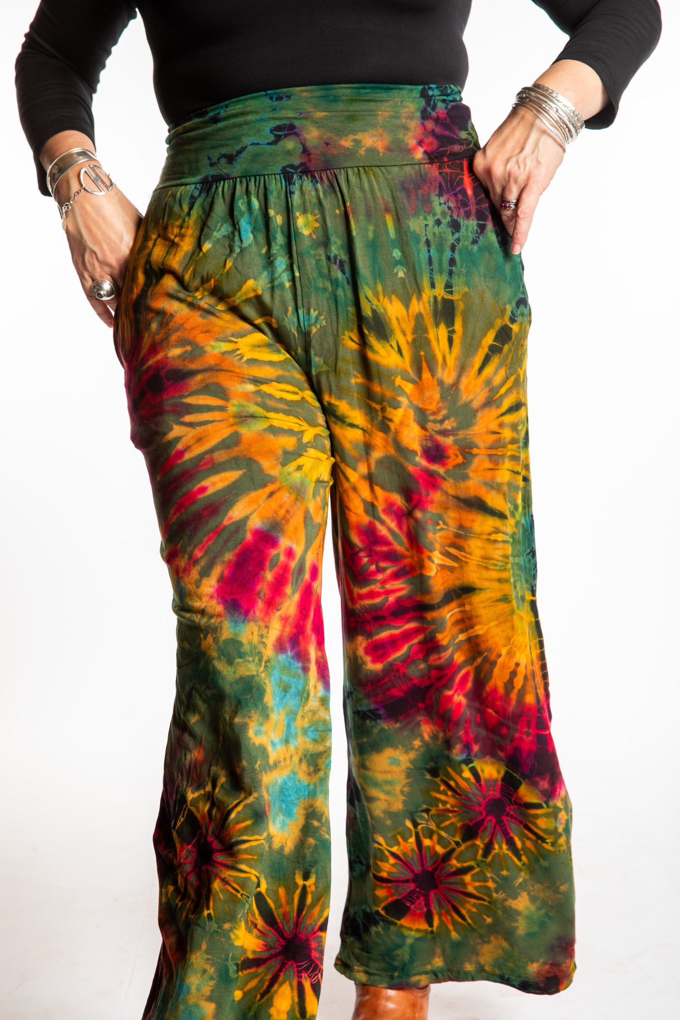 Susan wearing size S/M green tie dye pants in Green