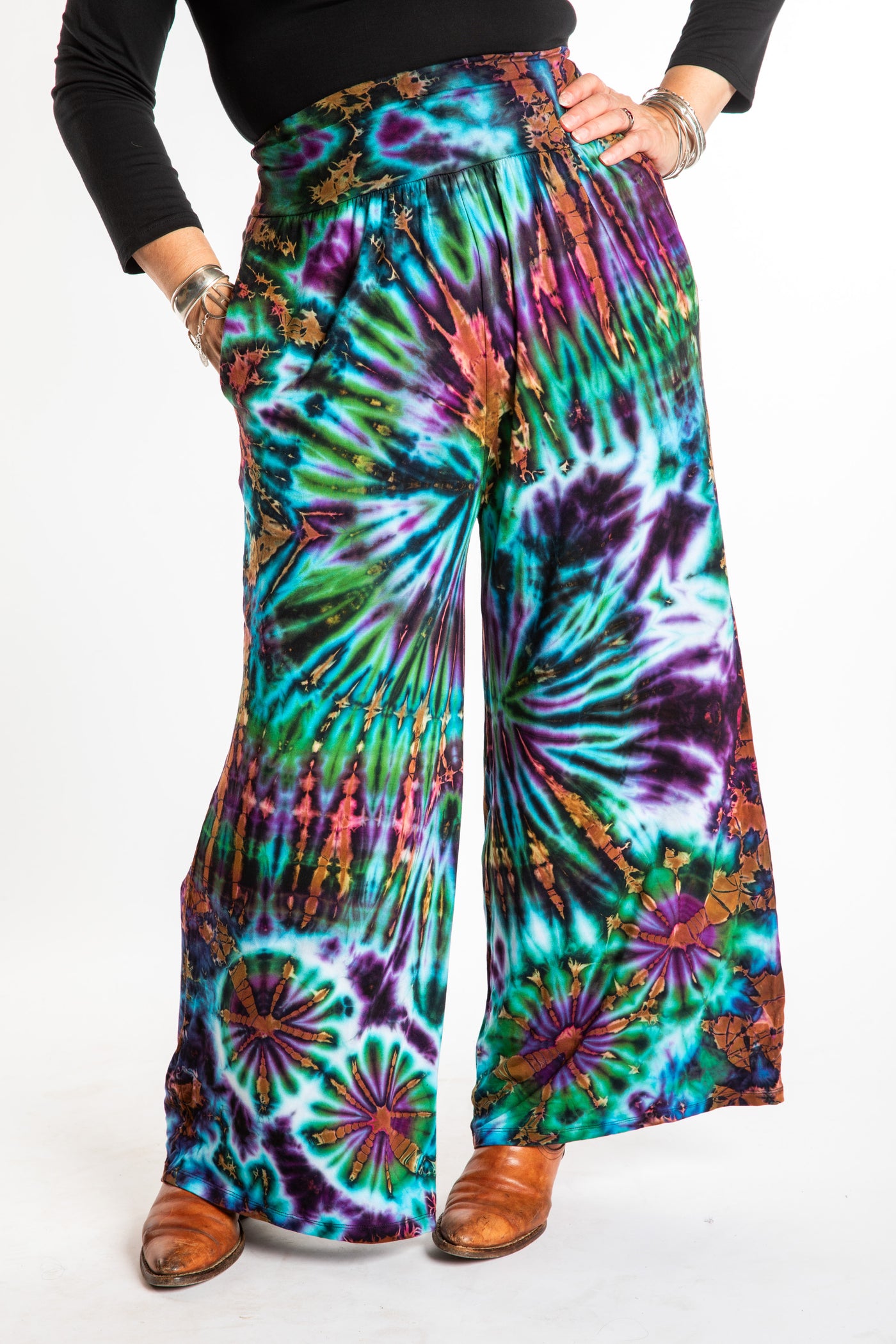 Susan wearing size S/M blue tie dye pants in Ocean