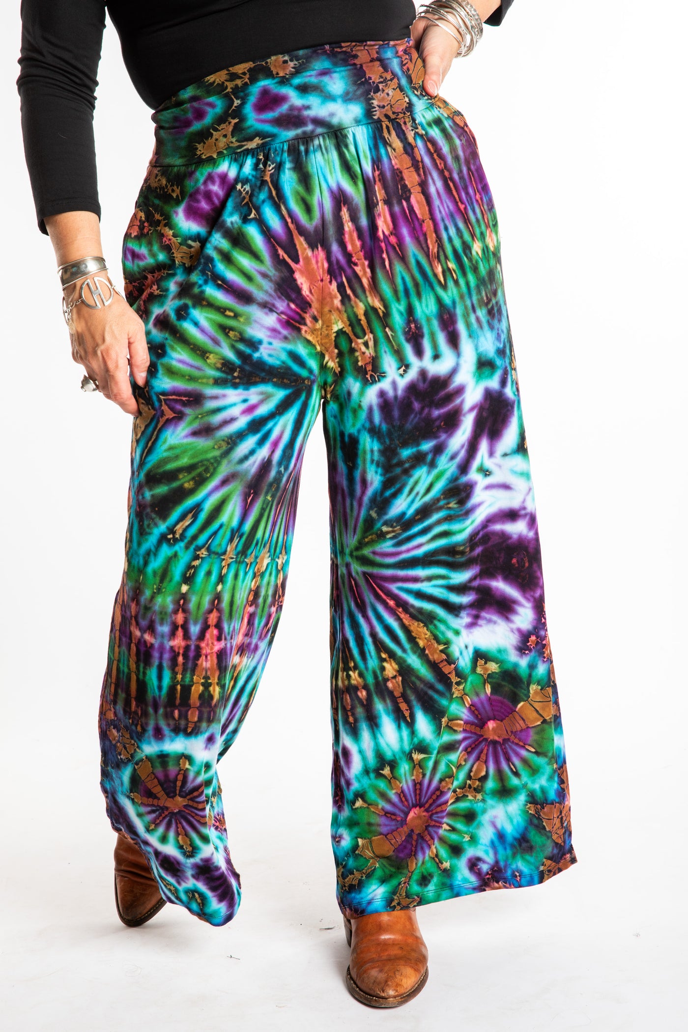 Susan wearing size S/M blue tie dye pants in Ocean