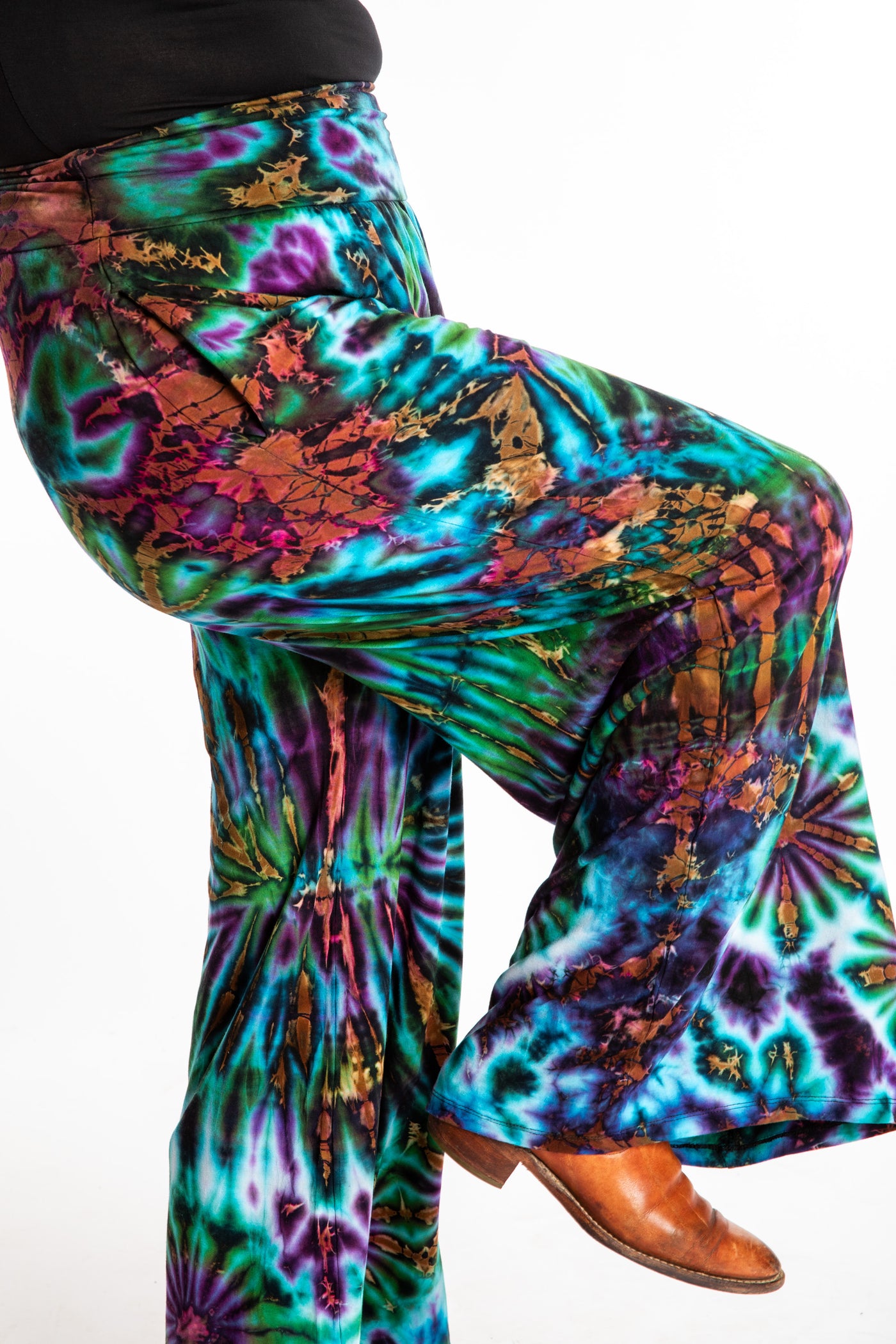 Susan wearing size S/M blue tie dye pants in Ocean