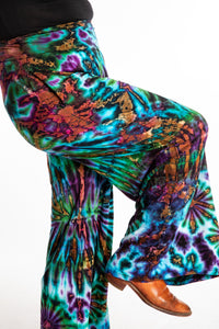 Susan wearing size S/M blue tie dye pants in Ocean