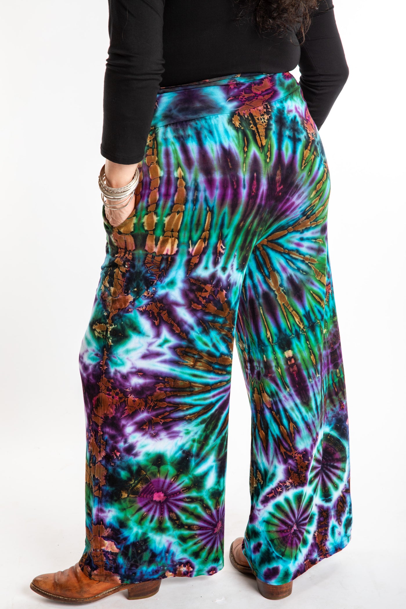 Susan wearing size S/M blue tie dye pants in Ocean