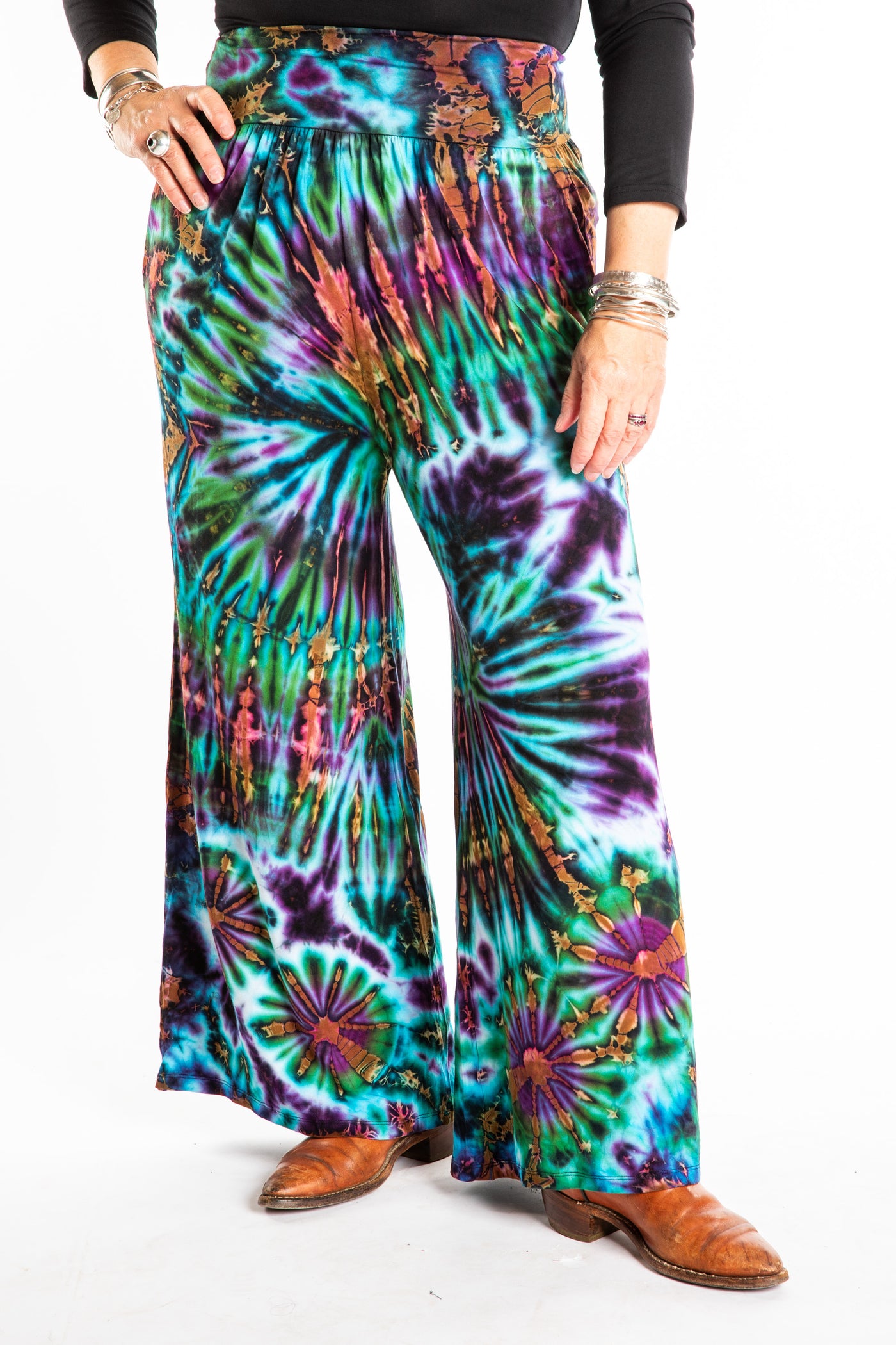 Susan wearing size S/M blue tie dye pants in Ocean