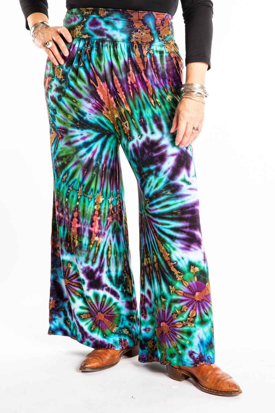Susan wearing size S/M blue tie dye pants in Ocean
