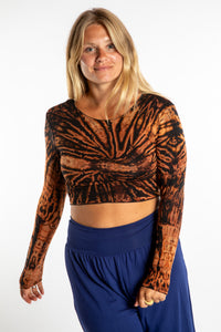 Sophie wearing a S/M orange tie dye long sleeve shirt in Black