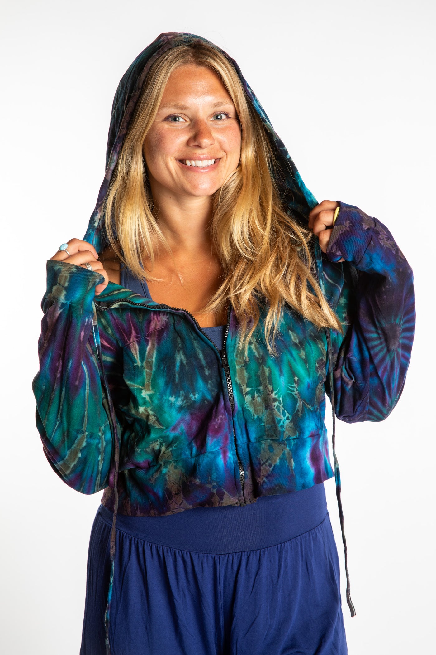 Sophie wearing a S/M blue tie dye cropped hoodie in Ocean