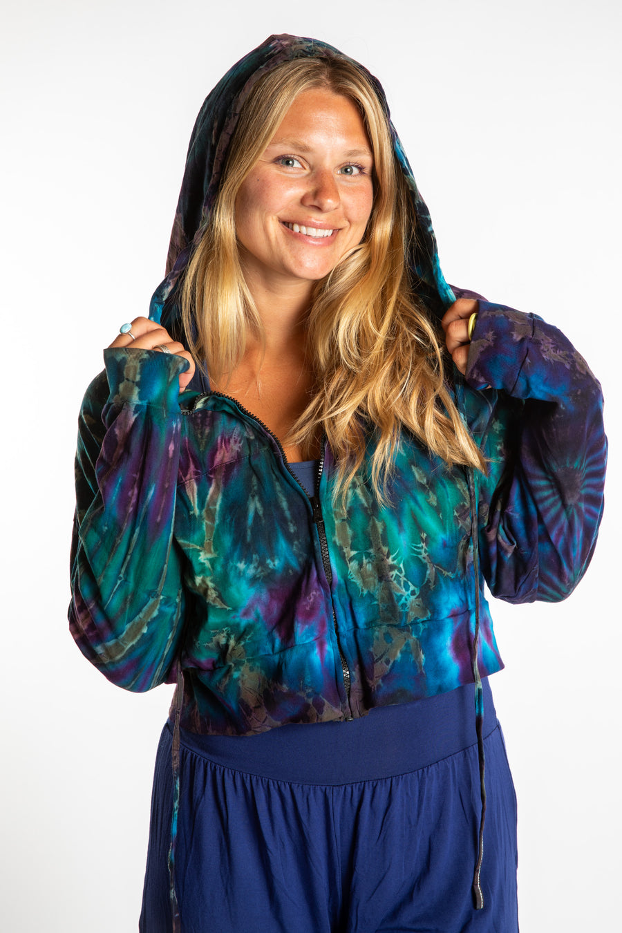 Sophie wearing a S/M blue tie dye cropped hoodie in Ocean