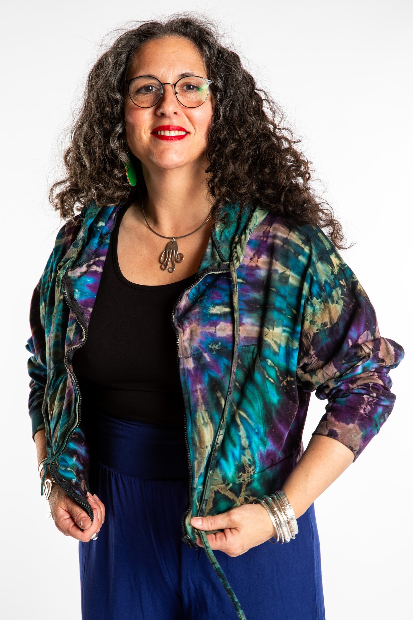 Susan wearing a M/L blue tie dye cropped hoodie in Ocean