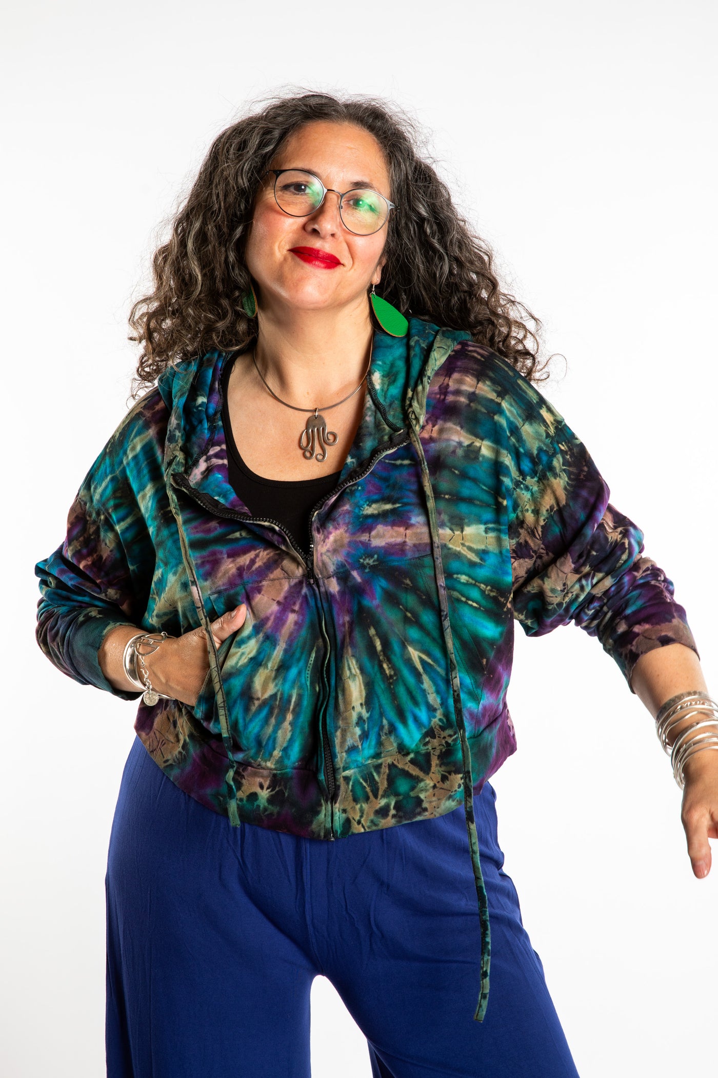 Susan wearing a M/L blue tie dye cropped hoodie in Ocean