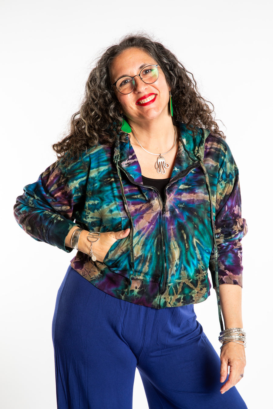 Susan wearing a M/L blue tie dye cropped hoodie in Ocean