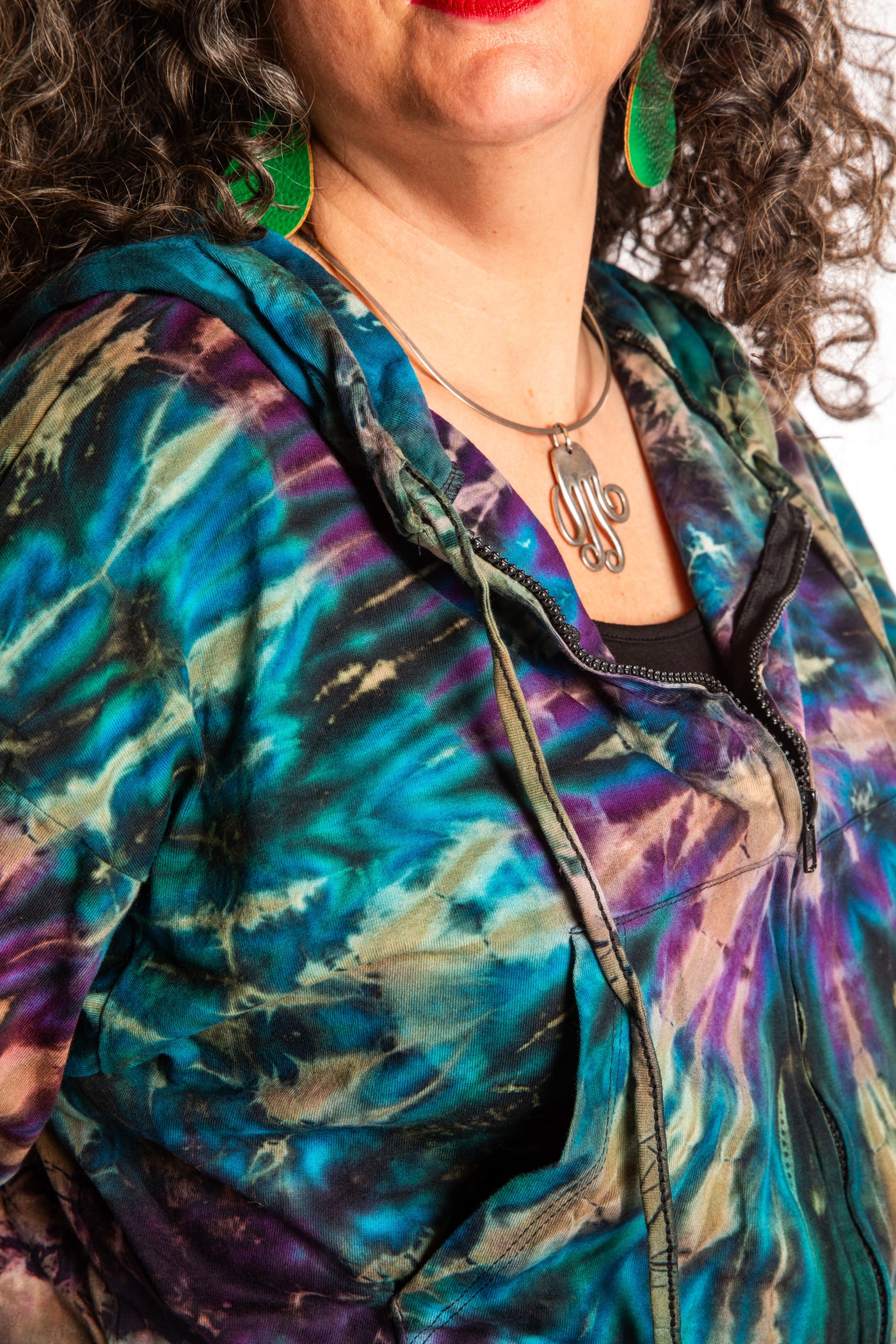 Susan wearing a M/L blue tie dye cropped hoodie in Ocean