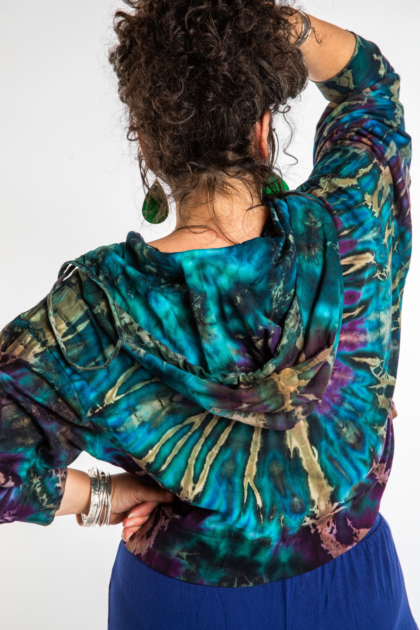 Susan wearing a M/L blue tie dye cropped hoodie in Ocean
