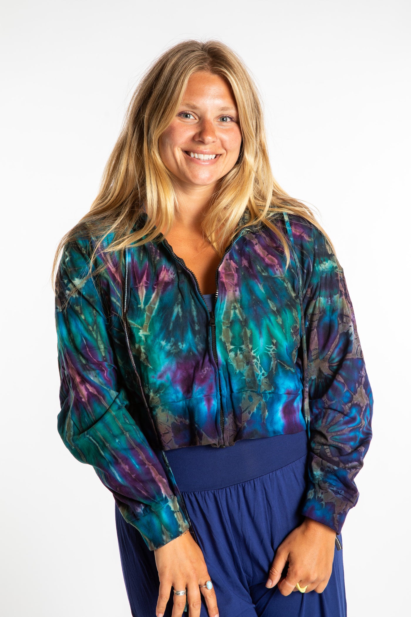 Sophie wearing a S/M blue tie dye cropped hoodie in Ocean