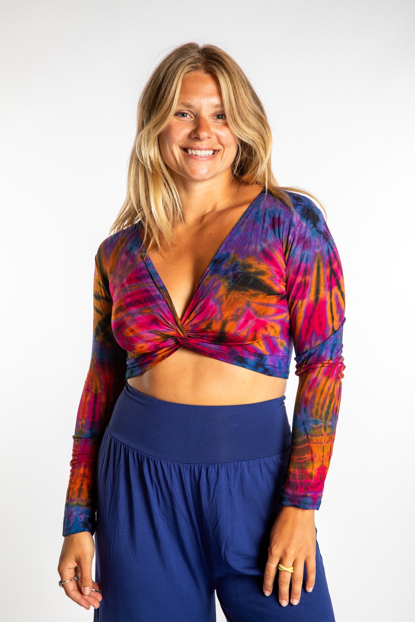 Sophie is wearing a S/M purple tie dye crop top in Purple