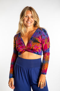 Sophie is wearing a S/M purple tie dye crop top in Purple