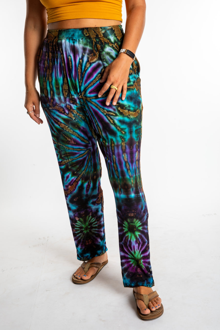 Sophie wearing blue tie dye pants in Black Orange