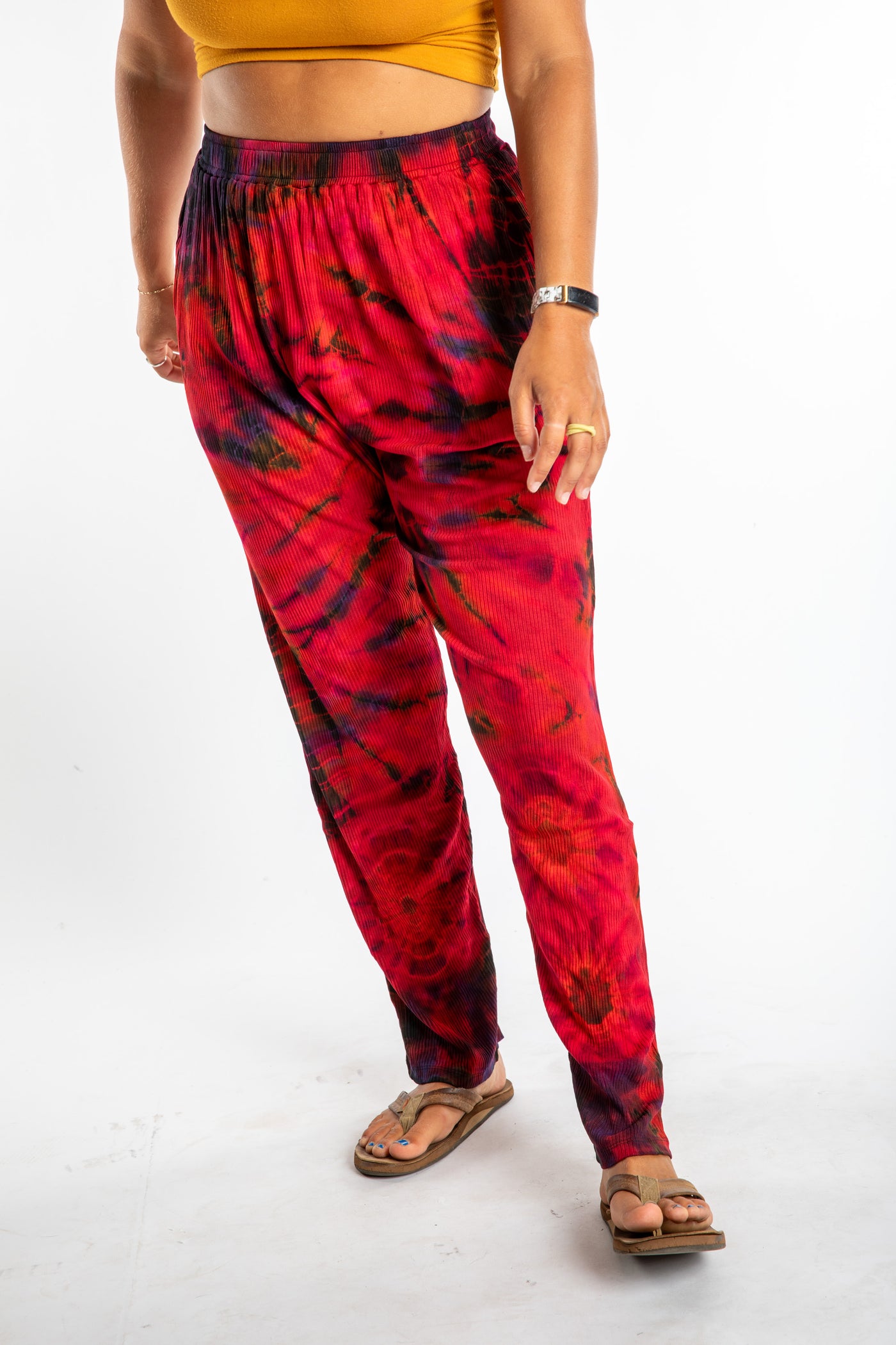 Sophie wearing red tie dye pants in Black Red