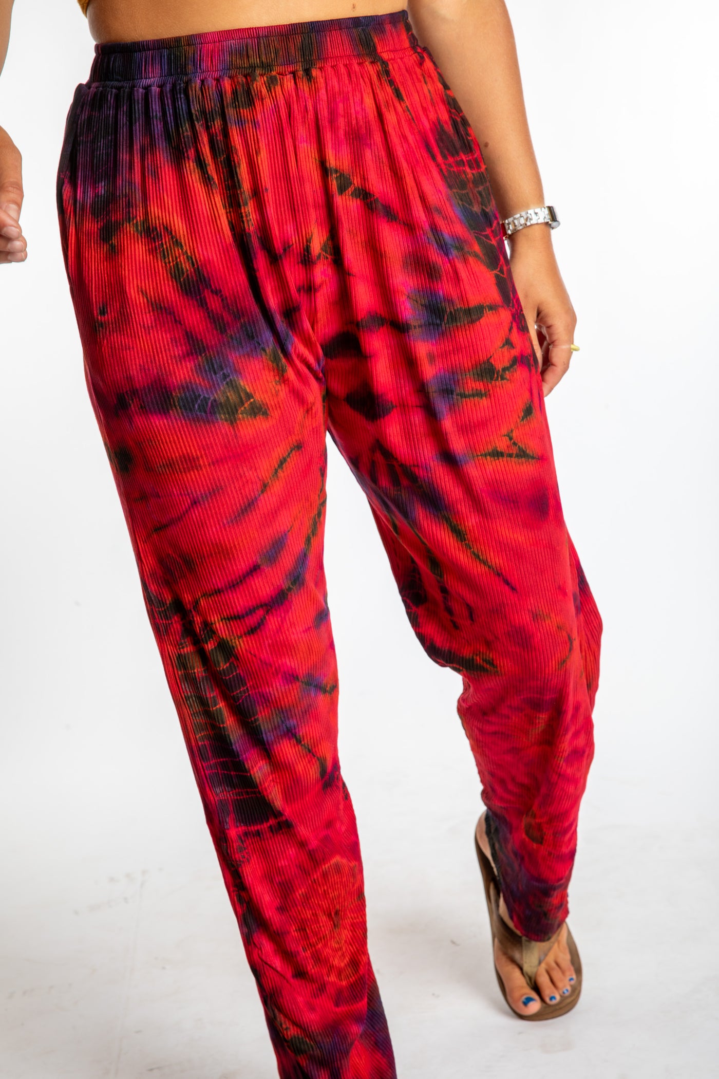 Sophie wearing red tie dye pants in Black Red