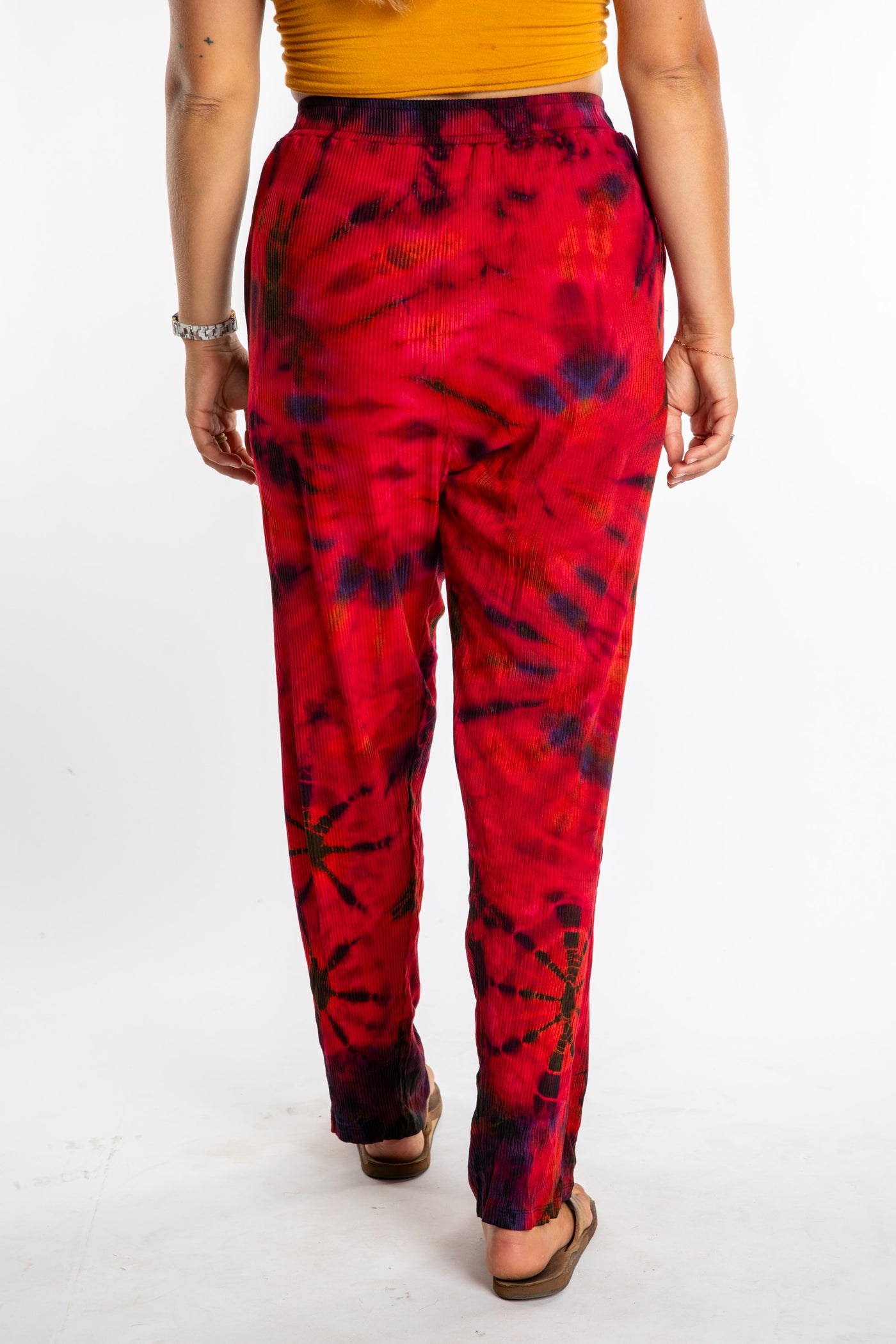 Sophie wearing red tie dye pants in Black Red