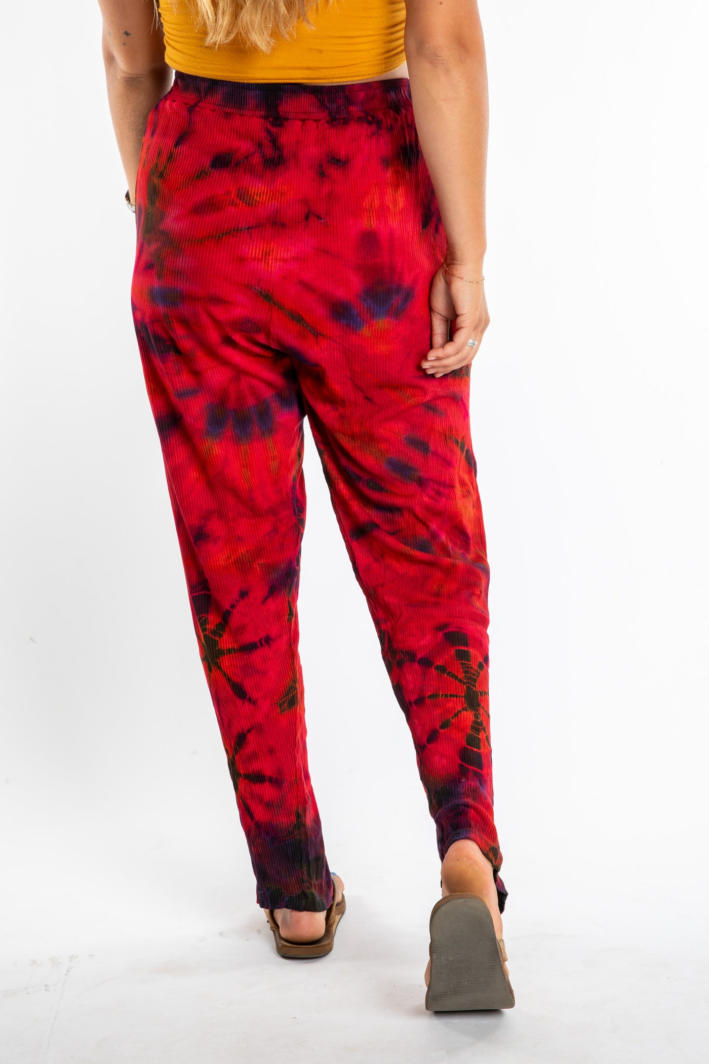Sophie wearing red tie dye pants in Black Red