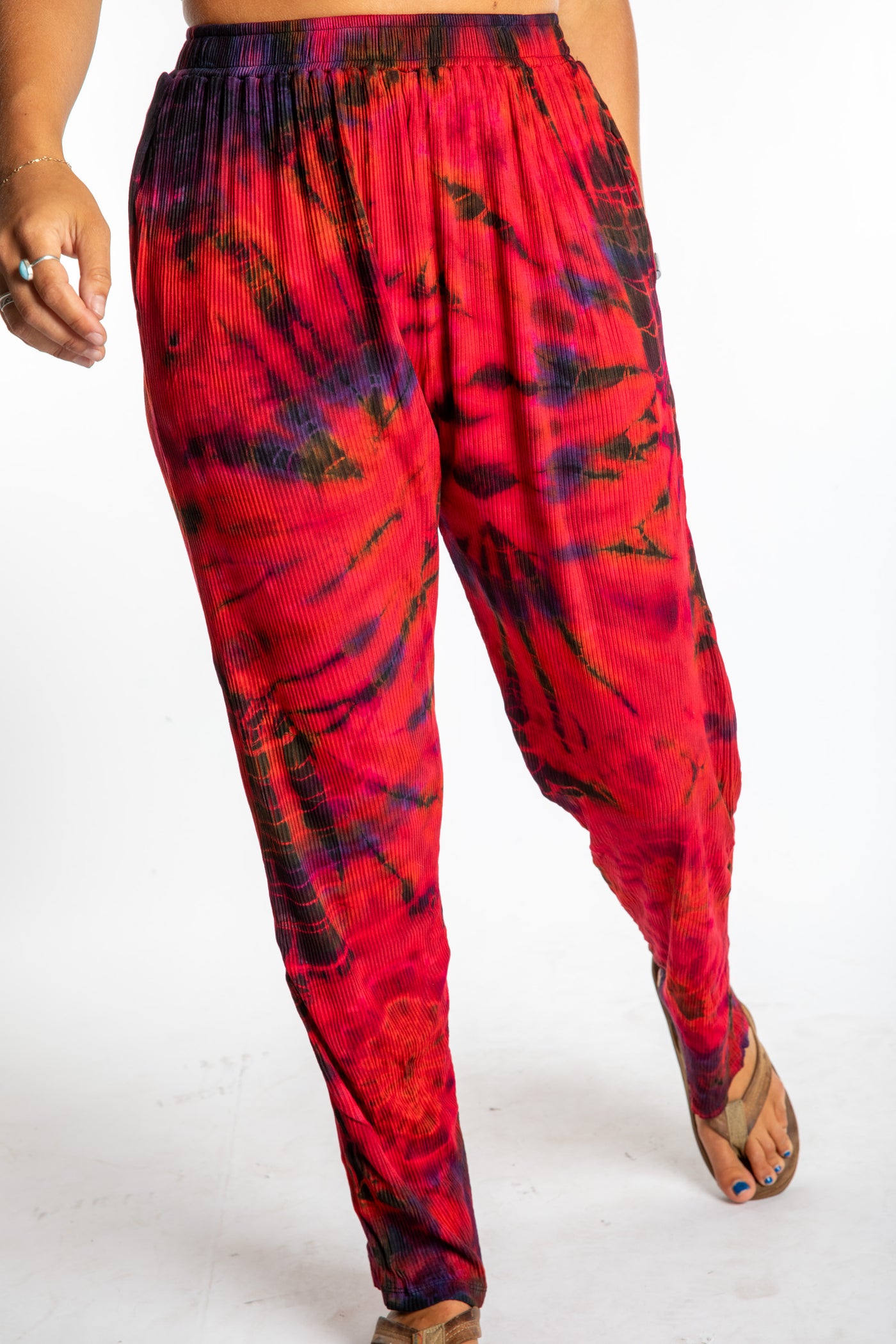 Sophie wearing red tie dye pants in Black Red