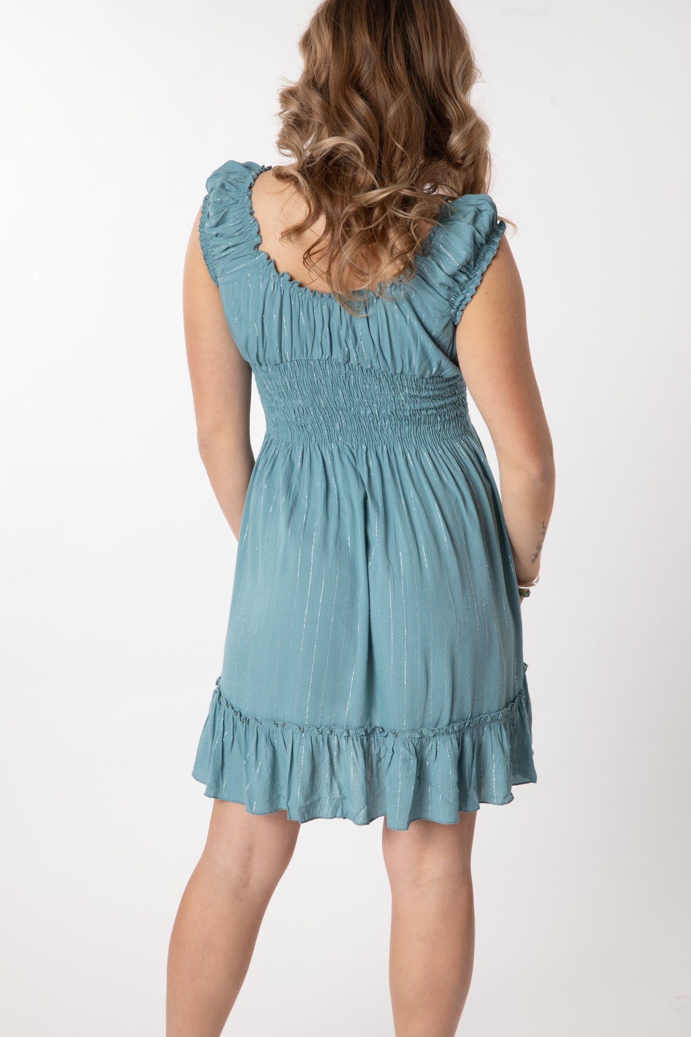 Jacalyn is wearing size S/M babydoll dress in sea blue