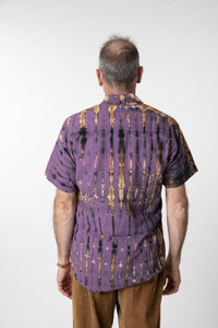 Ross is wearing size M cotton tie dye button up shirt in purple